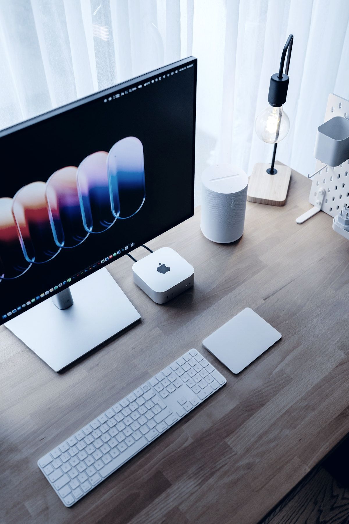 A desktop computer setup with a large monitor and keyboard.